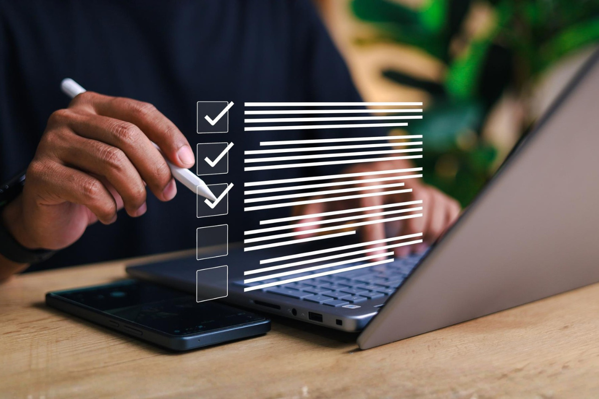 Checklist on a laptop screen as a candidate reviews EPSO AD5 application requirements and steps